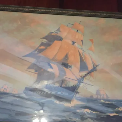 Sale Photo Thumbnail #11: Vintage framed print depicting a clipper ship sailing on rough seas, housed in a dark ornate wooden frame.