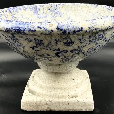 Sale Photo Thumbnail #26: Antique flow blue ironstone pedestal bowl featuring a heavily crazed glaze, scrollwork patterns, and a square base.