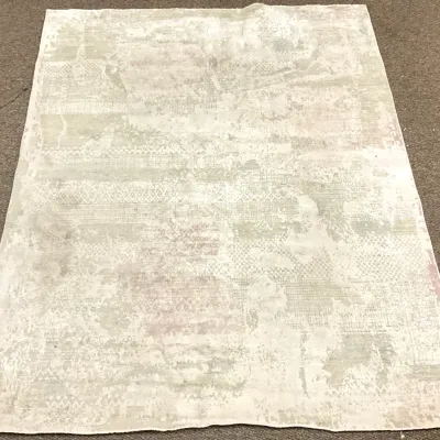 Sale Photo Thumbnail #13: Contemporary area rug featuring a distressed, abstract pattern in muted tones of beige, cream, and subtle pink.