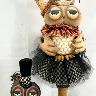 Sale Photo Thumbnail #66: Whimsical Halloween owl figurines, featuring a tall stacked-owl pedestal display and a smaller owl in a top hat, both designed in a folk-art style with fabric and tulle accents.