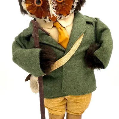 Sale Photo Thumbnail #70: Vintage dressed owl figurine featuring real feathers, a houndstooth cap, green felt jacket, and a wooden walking stick.