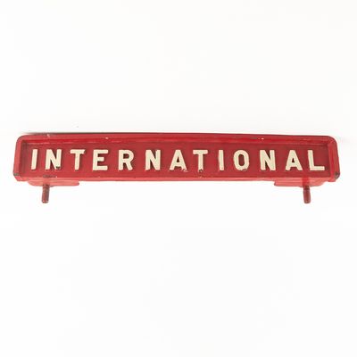 Sale Photo Thumbnail #157: Cast Iron International Tractor Emblem