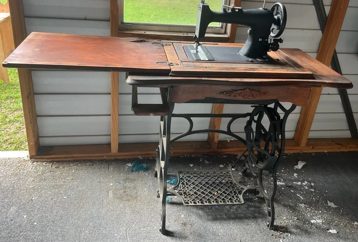 Vintage Treadle Sewing Machine In Wood Cabinet