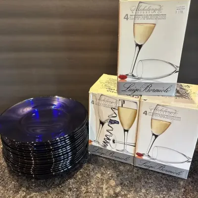 Champagne Glasses And Blue Glass Plates