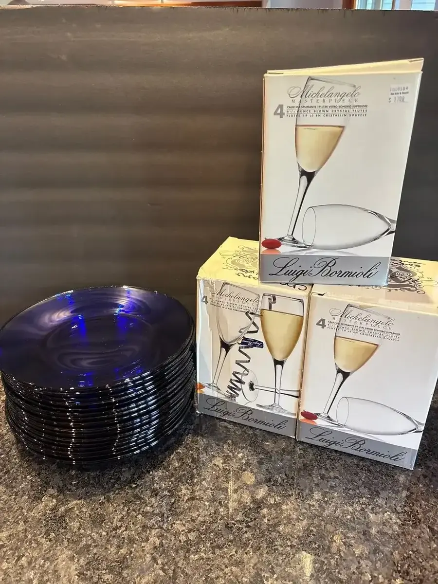 Champagne Glasses And Blue Glass Plates