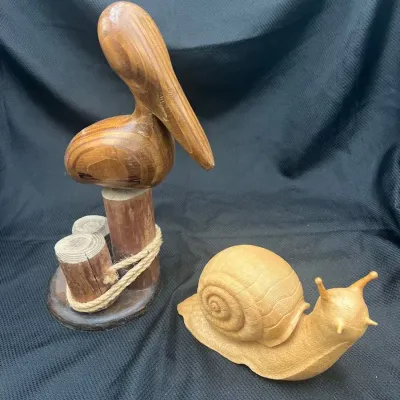 Wood Pelican and Resin Snail 