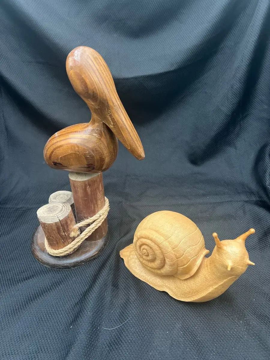 Wood Pelican and Resin Snail 