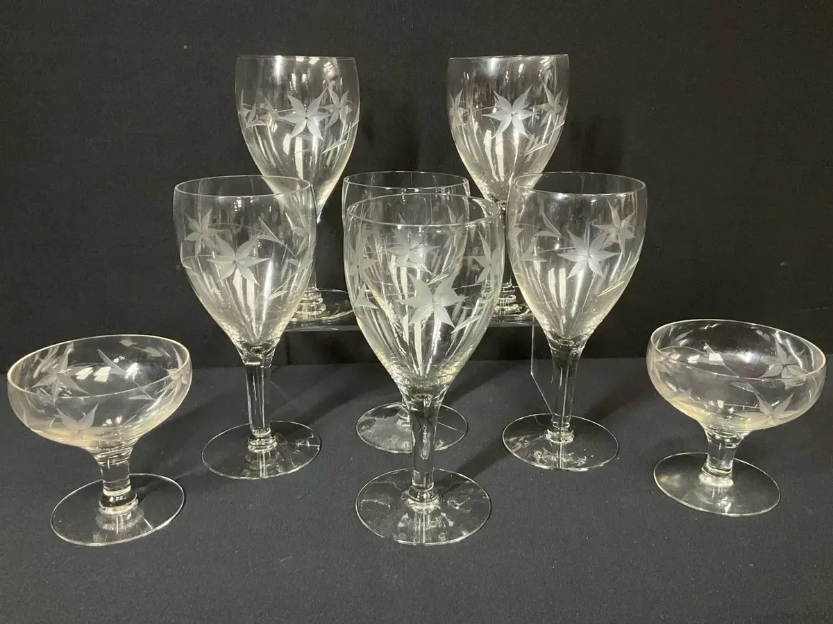 Etched Crystal Stemware And Champagne Coupes