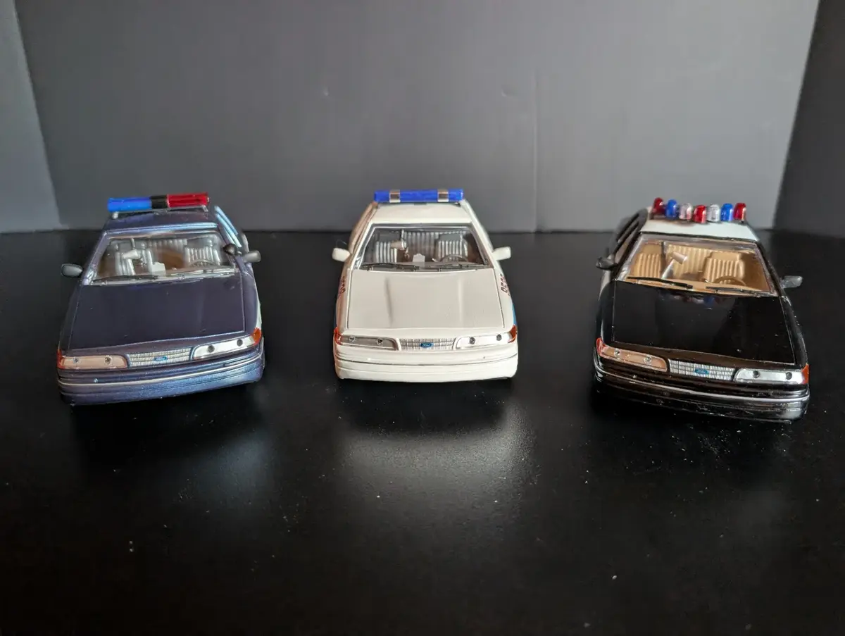 3 Code 3 Collectibles Limited Edition Ford Crown Victoria Police Cars