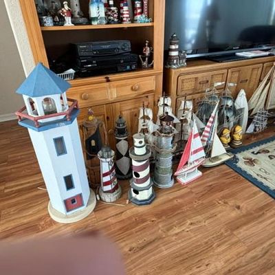 lighthouses, sailboats & figurines