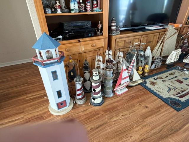 lighthouses, sailboats & figurines