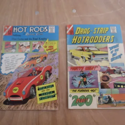 Sale Photo Thumbnail #8: Two vintage Charlton Comics issues, including Hot Rods and Racing Cars and Drag-Strip Hotrodders, showing some cover wear consistent with age.