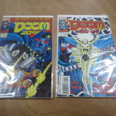 Sale Photo Thumbnail #15: Two Marvel Doom 2099 comic books, issues #1 and #2, individually bagged and boarded.