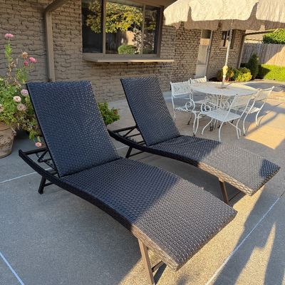 Pair chaise lounge & wrought iron set