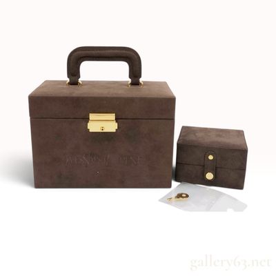 A Pair of Yves Saint Laurent Vintage Suede Jewelry and Vanity Cases for Travel