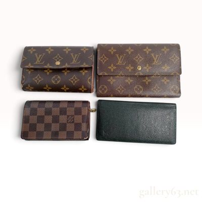 A Collection of Louis Vuitton Canvas and Leather Wallets
