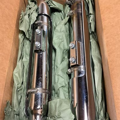 A Pair of Vance & Hines Chrome Slip-On Motorcycle Mufflers