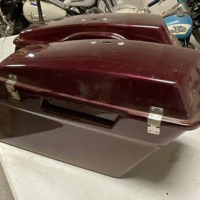 A Pair of Dark Burgundy Hard-Shell Motorcycle Touring Saddlebags