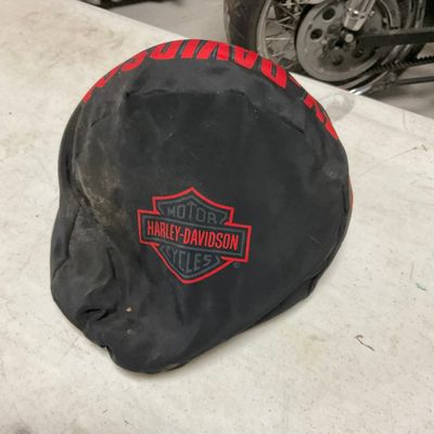A Trio of Harley-Davidson Motorcycle Items Including a Half-Helmet Branded Bag and Leather Gloves