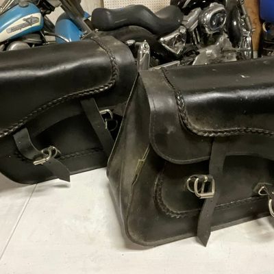 A Pair of Black Leather Braided Motorcycle Saddlebags