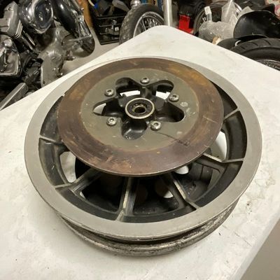 Nine Spoke Cast Aluminum Rear Motorcycle Wheel with Brake Rotor and Belt Drive Pulley
