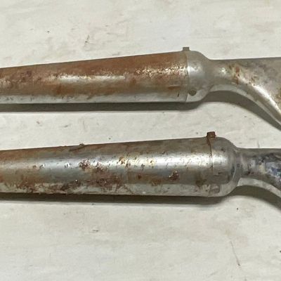 A Pair of Vintage Fishtail Motorcycle Exhaust Muffler Tips
