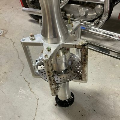 Custom Billet Aluminum Motorcycle Hub and Integrated 4-Piston Brake Caliper Assembly