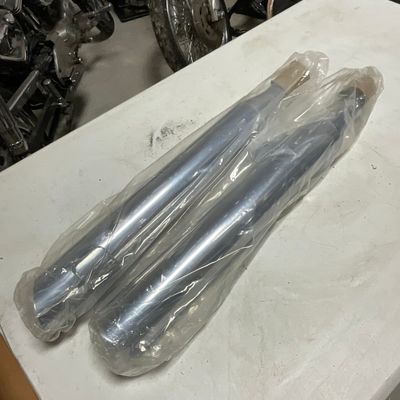 A Pair of Stock FXDF Motorcycle Mufflers