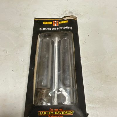 A Pair of Custom Chrome Shock Absorbers for Harley-Davidson Motorcycles