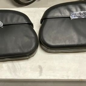 A Pair of Harley-Davidson Rigid Locking Leather Wrapped Hard Motorcycle Saddlebags