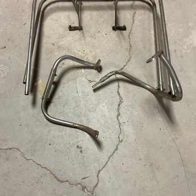 A Set of Vintage Chrome Rear Luggage Rack and Saddlebag Guard Rails