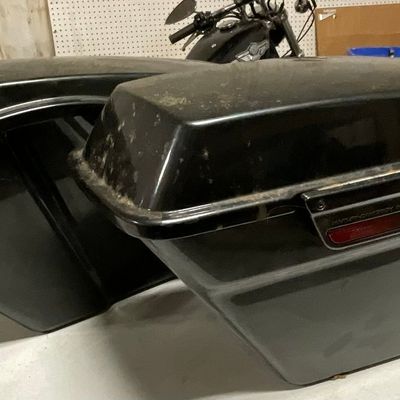 A Pair of Harley-Davidson Hardshell Motorcycle Saddlebags with Lids and Replacement Locks