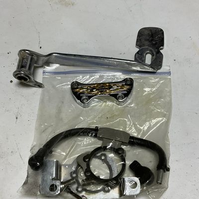 An Assortment of Harley-Davidson Chrome Motorcycle Parts and Accessories