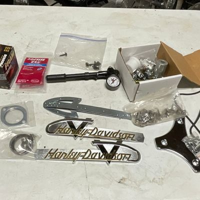 Assortment of Harley-Davidson and Fram Motorcycle Parts and Accessories