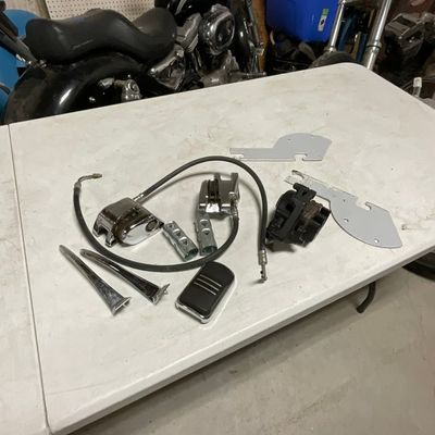 An Assortment of Motorcycle Brake Components and Trim