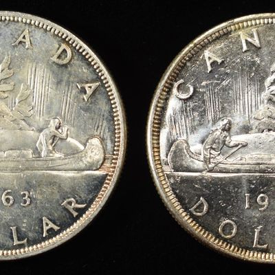 (2) 80% SILVER $1 CANADIAN COINS