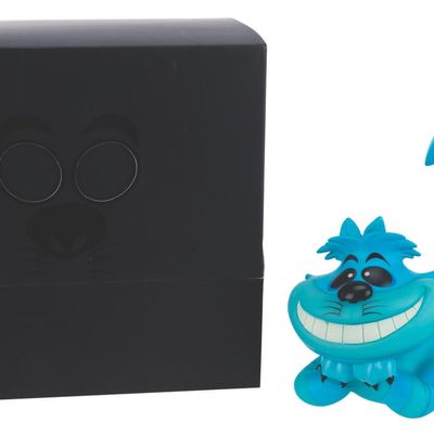 A Haunted Mansion Cheshire Cat Figure.