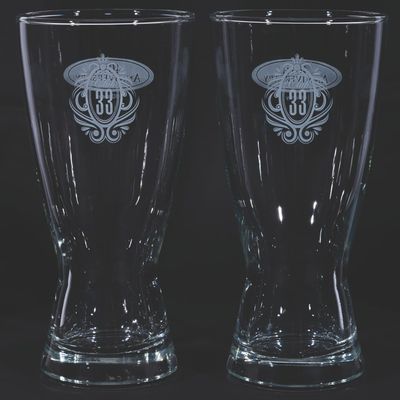 A Pair of Club 33 40th Anniversary Beer Glasses.