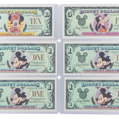 The Disneyland 1998 AA Series $1, $5, and $10 Bills.