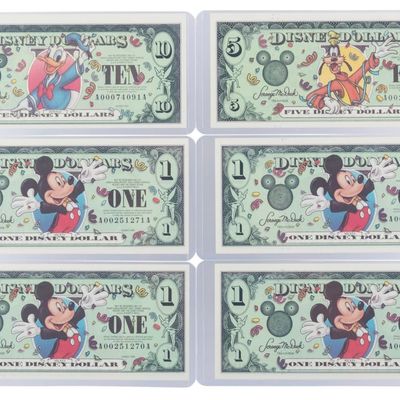 The Disneyland 2000 AA Series $1, $5, and $10 Bills.