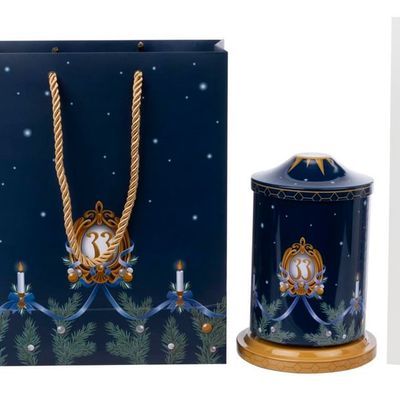 A Club 33 Candlelight Processional Cookie Tin Music Box and Menu.