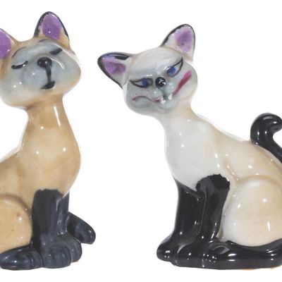 A Pair of "Lady and the Tramp" Si and Am Figurines.