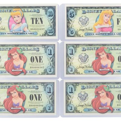 The 2007 Disney Dollars 20th Anniversary Series $1, $5, and $10 Bills.