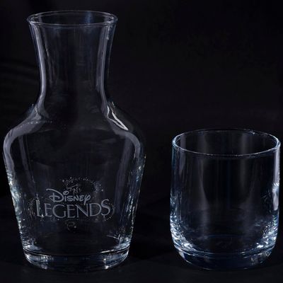 A Disney Legends Glass Carafe and Tumbler Set.