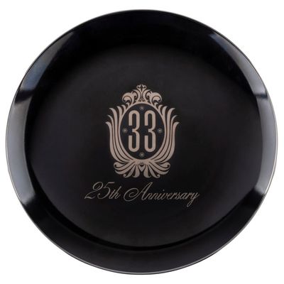 A Disneyland Club 33 25th Anniversary Plate.
