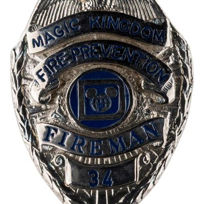 A Magic Kingdom Fireman Badge.