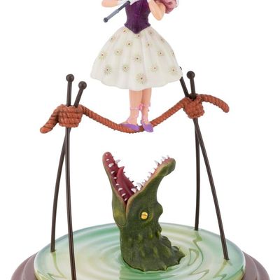 A Haunted Mansion Stretch Portrait Tightrope Figurine.