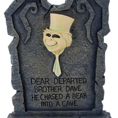 A Haunted Mansion Light-Up Tombstone Figure.