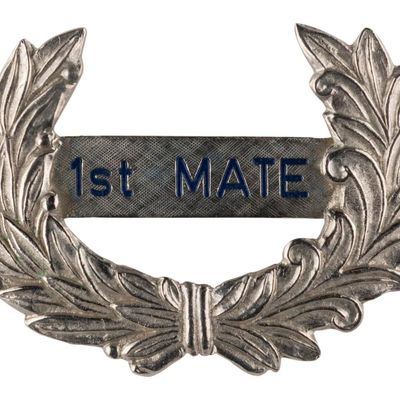 A Riverboat 1st Mate Hat Badge.