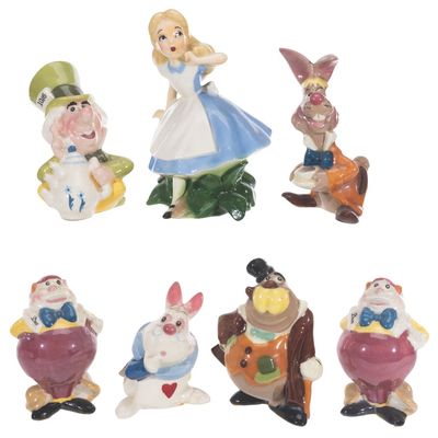 A Set of "Alice in Wonderland" Ceramic Figurines by Evan K. Shaw.